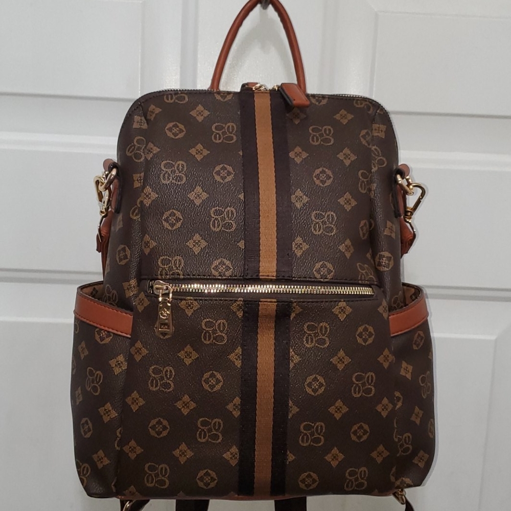 Brown and tan Lg. Backpack. Can be sholder…